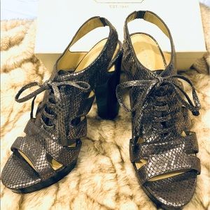 Coach Metallic leather sandals.